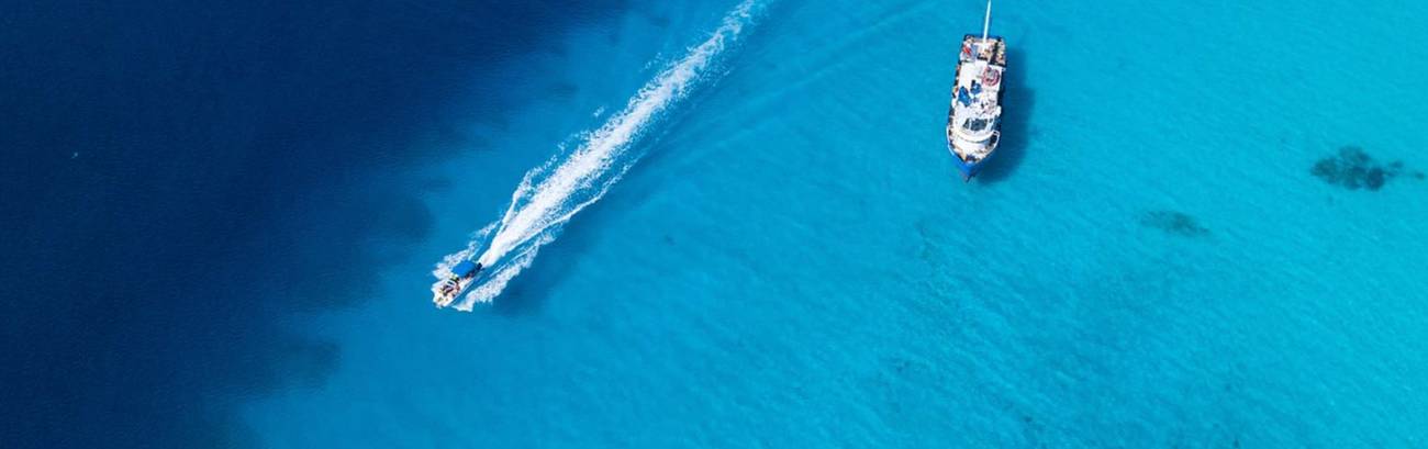 Calm turquoise sea and white sand on the west coast of Grand Turk, Turks and Caicos