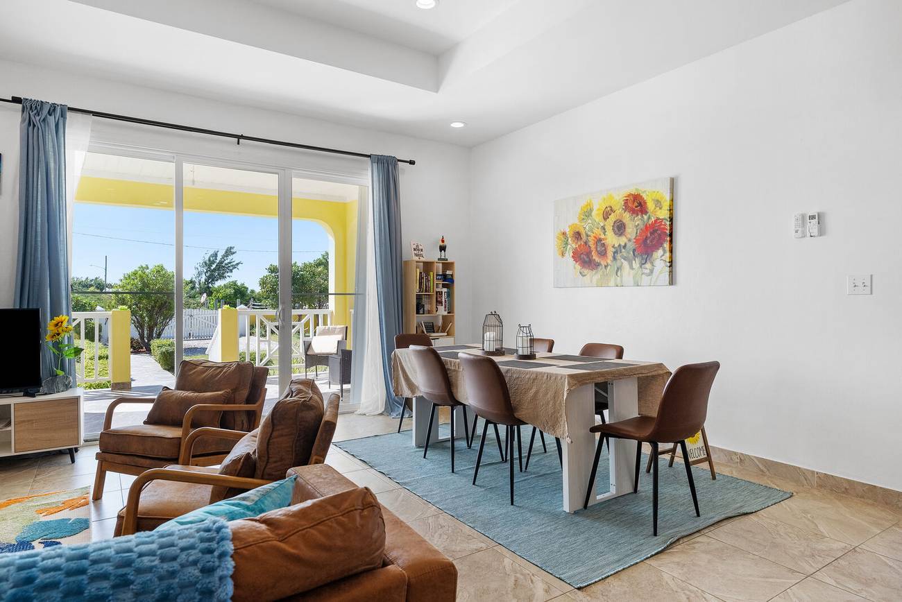 Dining table for six beside the living area